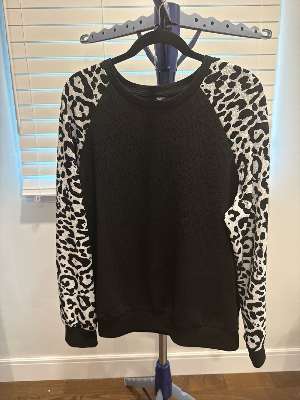 SHEIN Black Sweater with Black-and-White Leopard Print Sleeves